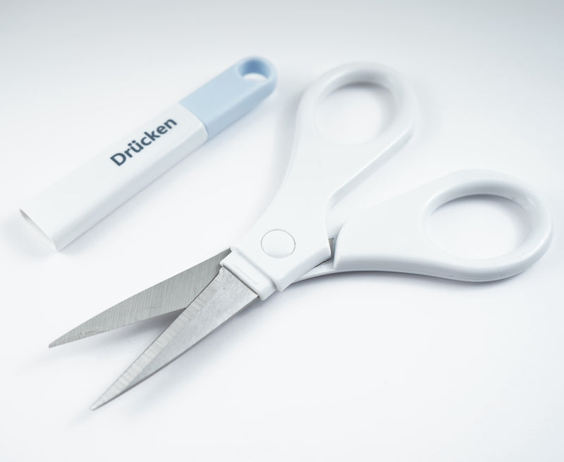 Scissors (Provide Precision cuts)